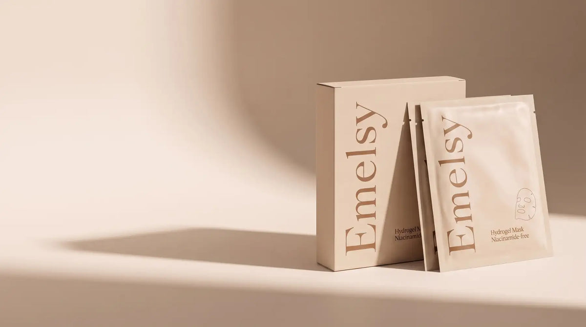 Emelsy beige box and sachets in soft studio light